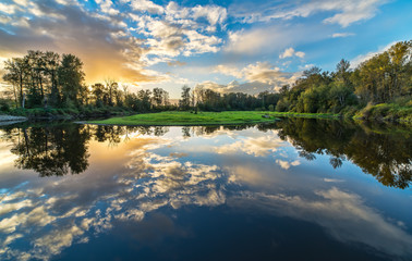 Fotobehang - Wide Angle River Clouds Reflection