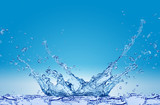 Fototapeta Fototapety do łazienki - Plusk wody na niebieskim tle