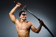 © Elnur - Man with sword and face paint