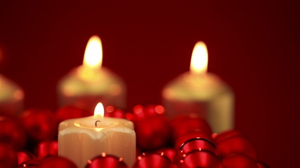 Wall Mural - candles burning in christmas ball ornaments