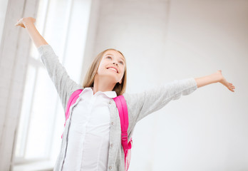 Poster - happy teenage girl with raised hands