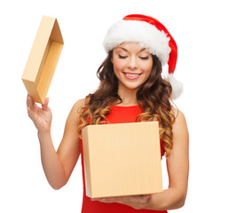 Sticker - smiling woman in santa helper hat with gift box