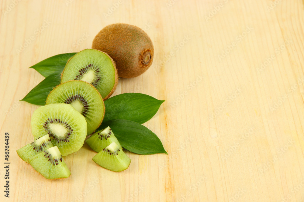 Ripe kiwi on wooden table close-up