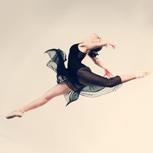 Beautiful Ballet-dancer Posing On Studio Background