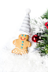 Gingerbread Man Christmas Cookie and Christmas decorations on  w