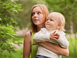 © tiplyashina - young woman with her baby son