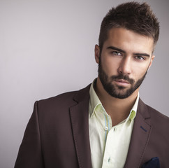 Elegant young handsome man. Studio fashion portrait.