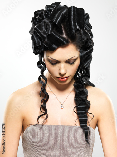 Fototapeta na wymiar Beautiful woman with fashion hairstyle