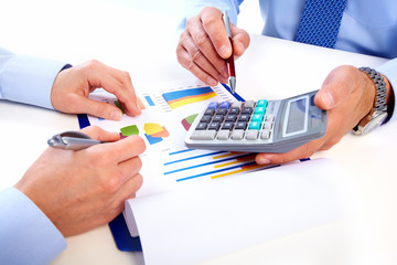 Aufkleber - Hands of business people with calculator.