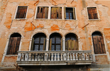 Beautiful old balcony in the uninhabited building