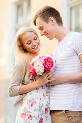 Wall Mural - couple with flowers in the city