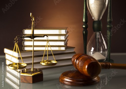 Fototapeta do kuchni Wooden gavel and book, Legal hourglass