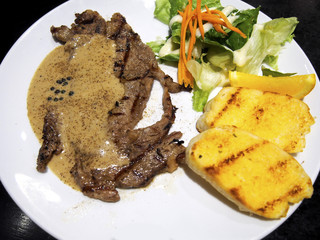 Beef steak and salad in the dish