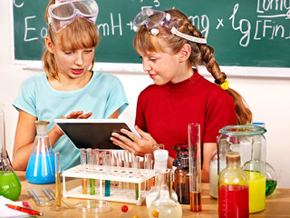 Wall Mural - Child in chemistry class.