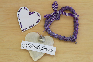 Wall Mural - friends forever card with wooden, wicker and canvas hearts