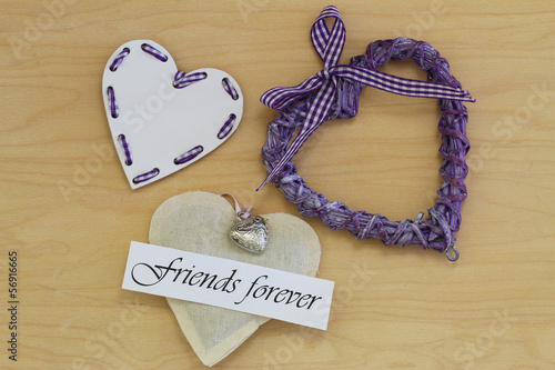 Fotografie, Obraz Friends forever card with wooden, wicker and canvas hearts
