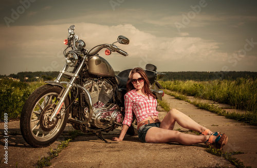 Obraz w ramie Biker girl and motorcycle