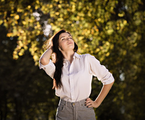 summer fashion portrait of young beautiful stylish girl posing o