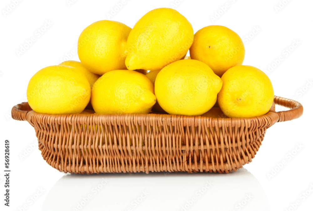 Ripe lemons in wicker basket isolated on white