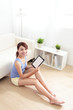 © ryanking999 - happy woman using tablet pc on sofa