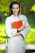 © mr.markin - Portrait of smiling business woman with paper folder. Student