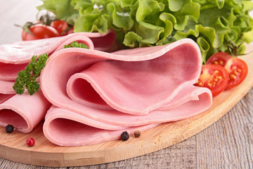 Sticker - sliced pork ham with salad and tomato