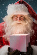 © Milles Studio - Portrait of happy Santa Claus opening gift box