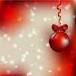 рождественский фон с красным елочным шаром и ленточкой