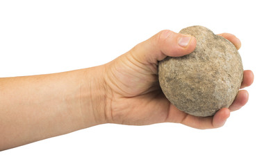 Hand holding stone ball