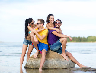 Poster - group of friends having fun on the beach