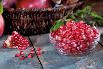 old wooden board with pomegranates