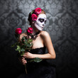 attraktive junge Frau mit Sugar Skull Make-Up