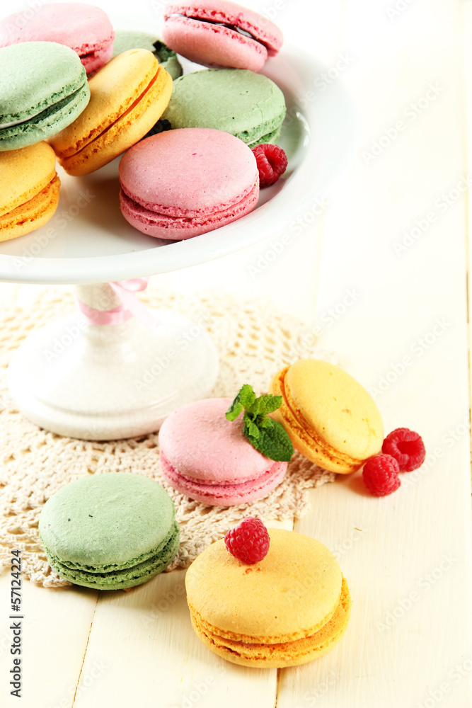 Gentle macaroons in vase on table close-up