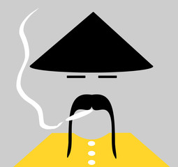 asian man wearing traditional conical hat and smoking