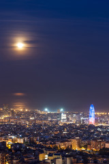 Canvas Print - Barcelona at night with full moon, Spain