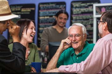 Group in Cafe Laughing