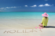 Girl Relaxing On The Beach Of Exuma, Bahamas