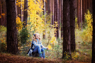 girl in autumn forest