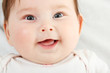 © Khorzhevska - cute funny infant smiling, beautiful kid's face closeup