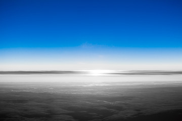 Canvas Print - height of 10 000 km.  clouds from airplane window