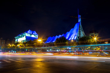 traffic light trails on modern city urban road 