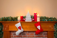 Christmas Stockings Over A Fireplace