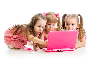 group of kids friends looking at the laptop