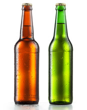 Bottles Of Beer With Water Drops On White Background