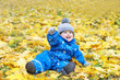 happy smiling baby outdoors in autumn