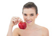 © lightwavemedia - Beautiful natural brown haired model holding an apple