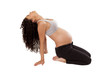 Yoga moves performed by a pregnant woman.