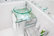 Crystal sink in a clean an modern design bathroom
