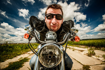 Fotomurales - funny biker racing on the road