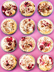 Chocolade and Cherry Festive Muffins in a pink colored baking tr